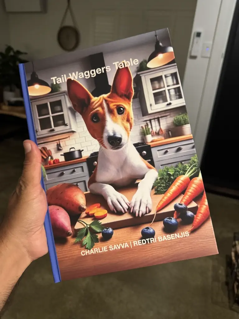 tailwaggerstable-hand.webp